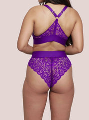 Purple lace lingerie set on a plain background